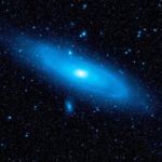 The nearby Andromeda galaxy with older stars highlighted in blue. A new theory of quantum gravity could help explain why more distant galaxies seem to be retreating faster than nearer ones.