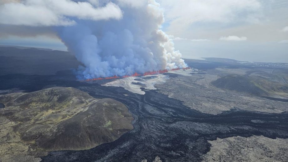 An aerial picture of a volcanic fissure spewing lava in Iceland.