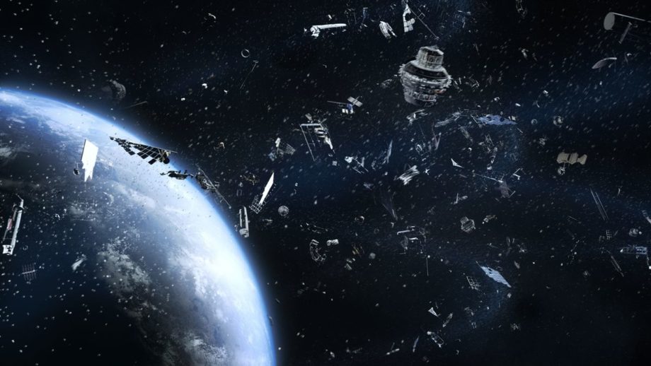 An illustration of tons of orbital debris spinning through space over Earth